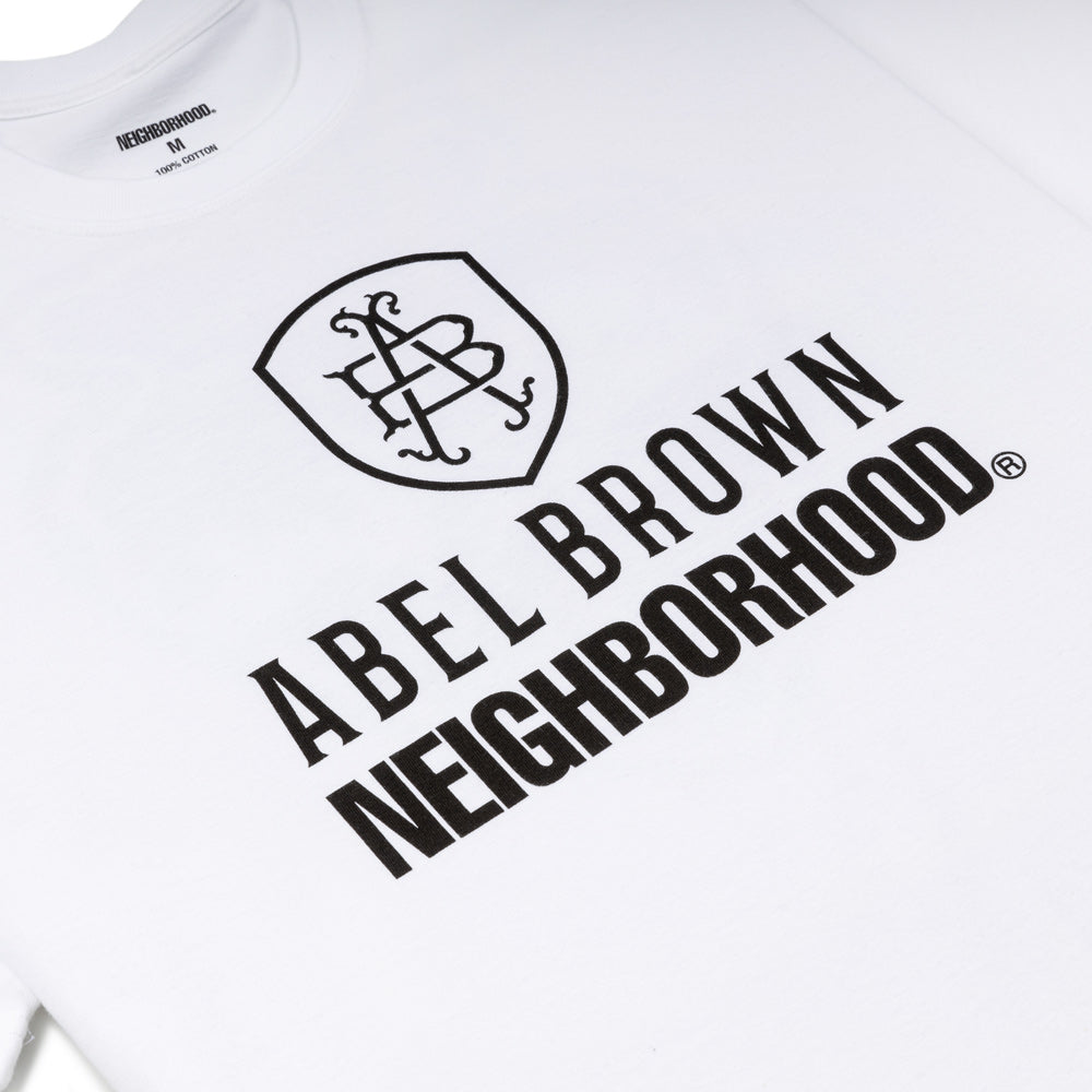 NH. x Abel Brown. SS-1 Tee | White