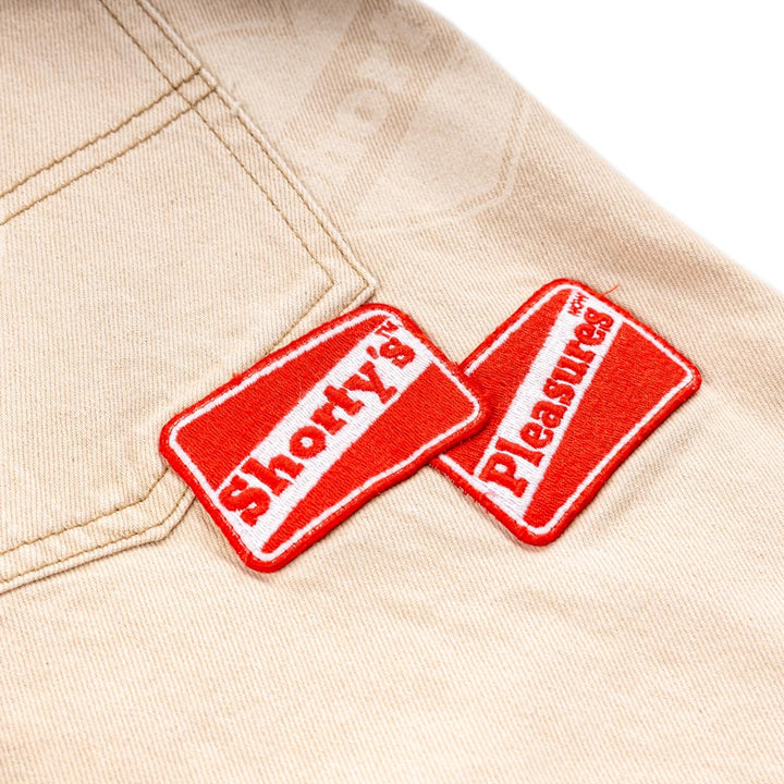 Pleasures x Shorty's Heart Ultra Work Pants | Beige